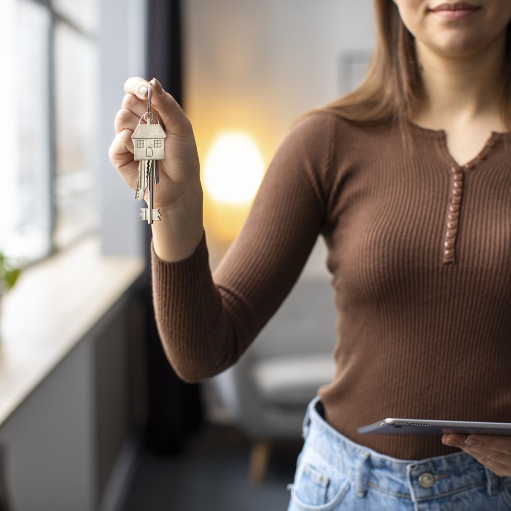 front-view-woman-holding-keys